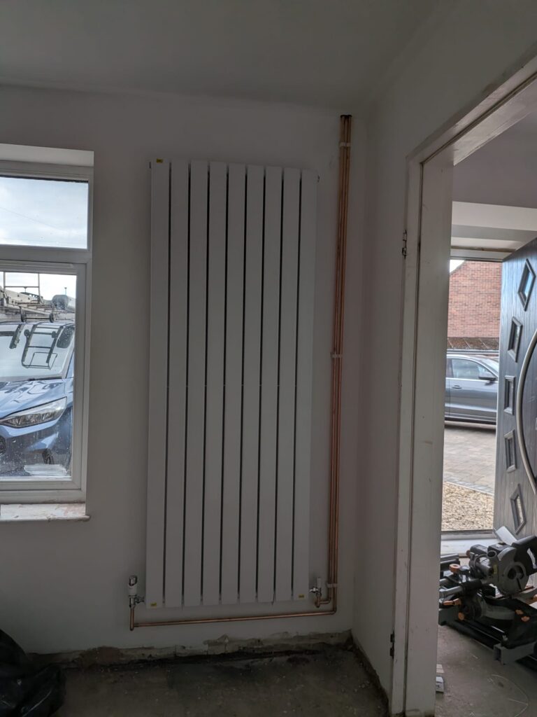 New radiator installation and pipe work completed 768x1024